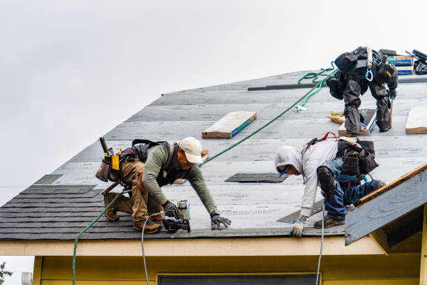 Professional Gutter Installation technician working in Bishop, CA